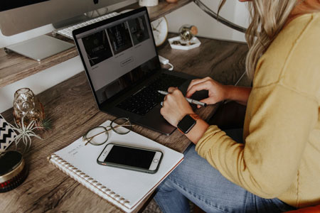 Woman working from home on a laptop